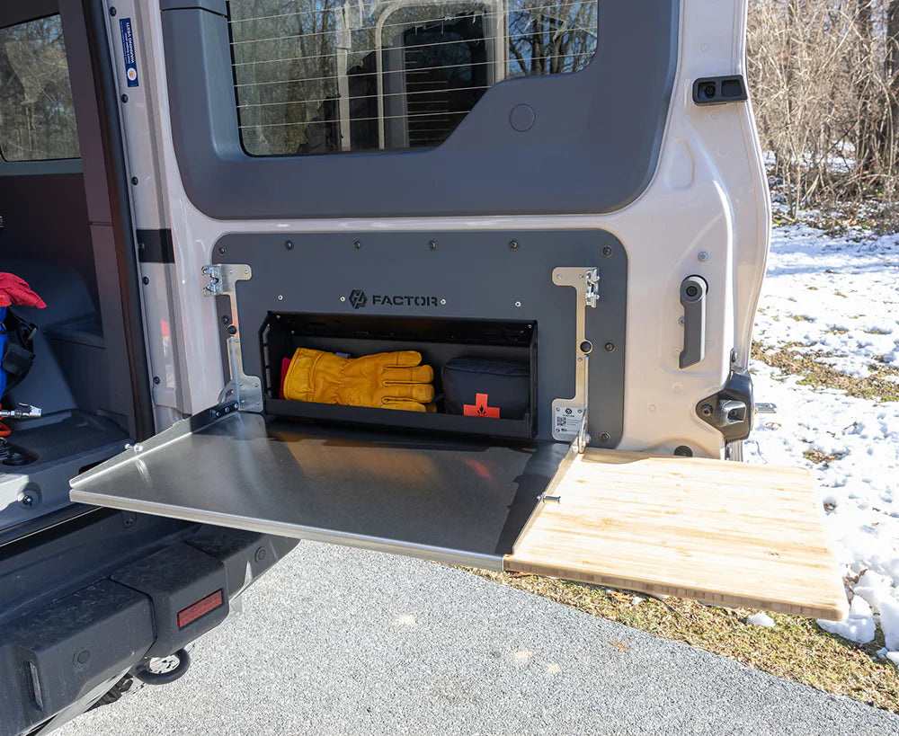 Ineos grenadier folding tailgate table with extended storage cubby